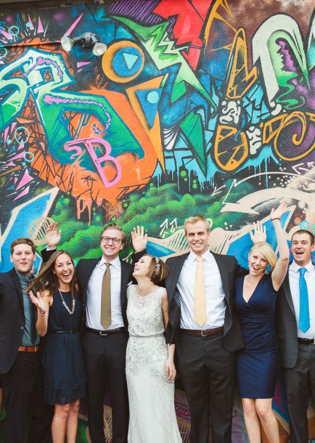 Wedding party in front of street art in Denver, Colorado