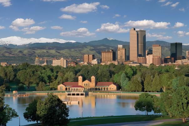 City Park Boathouse on the lake and Denver City Skyline